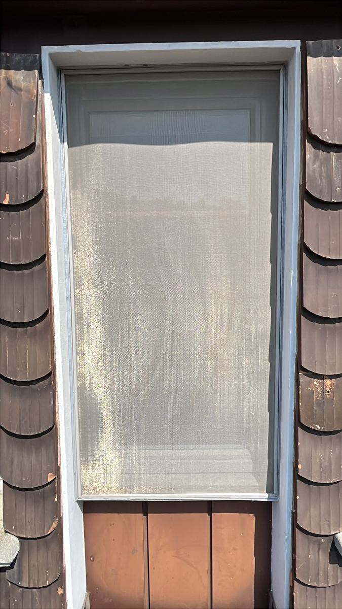 Insect screen door fitted — after