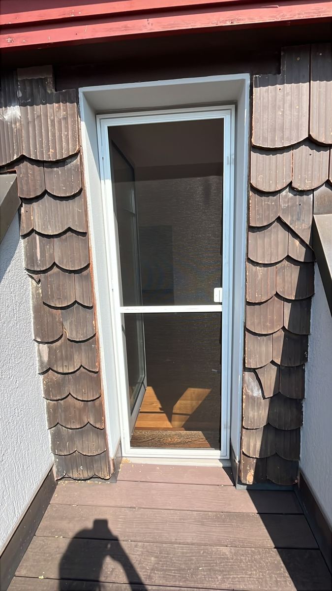 Insect screen door fitted — before